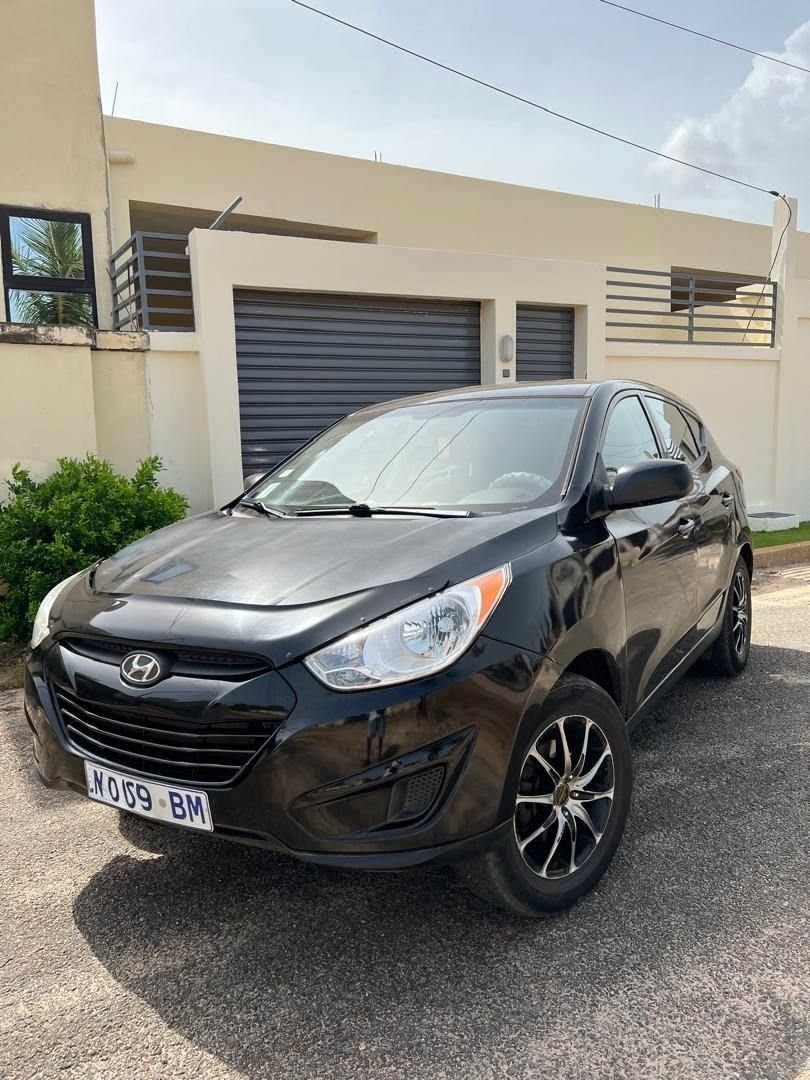 Tucson i35 — location de voiture Lomé, Togo